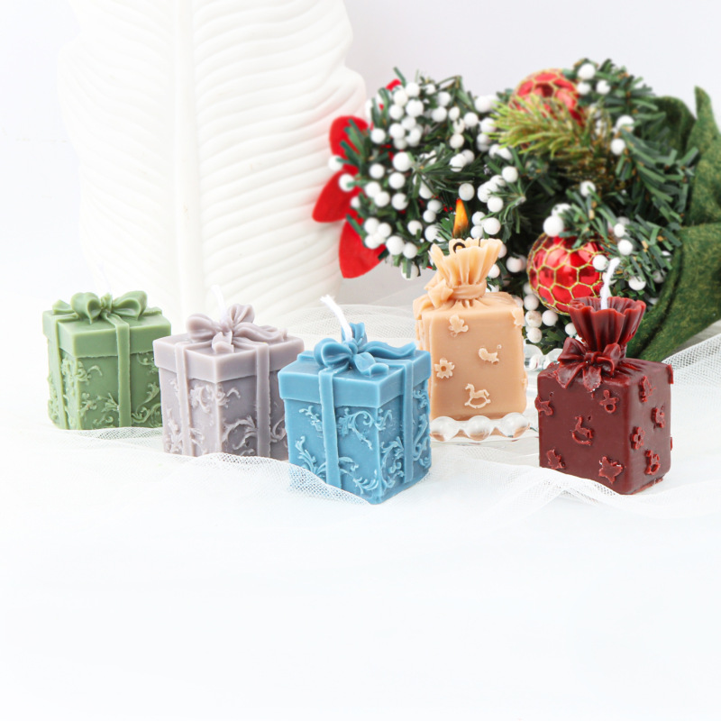 クリスマスの蝶結びのプレゼントの箱のろうそくの型diyの口の贈り物の箱のろうそくの型のシリカゲルのゴムの石膏は砂糖の型をひっくり返します。|undefined