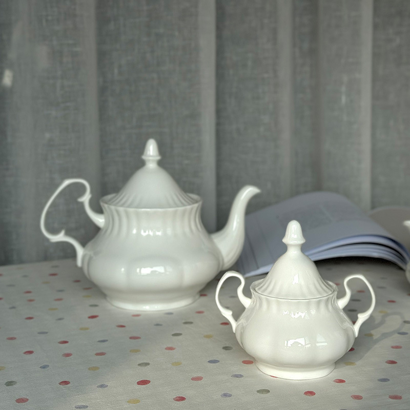 Elegant vintage coffee pot ceramic sugar jar milk jar pumpkin pot pure white relief teapot sugar jar large capacity water bottle Elegant vintage coffee pot ceramic sugar jar milk jar pumpkin pot pure white relief teapot sugar jar large capacity water bottle