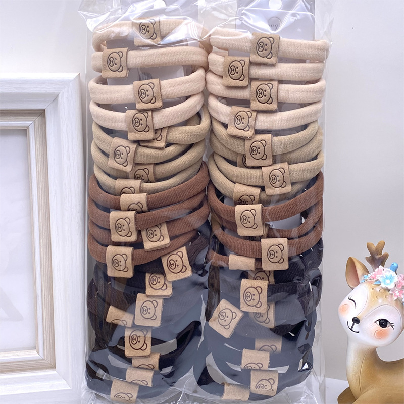 009 leche color té Toalla grande etiqueta de tela banda para el cabello cuerda para el cabello banda de goma un yuan dos yuanes tienda accesorios para el cabello accesorios para la cabeza