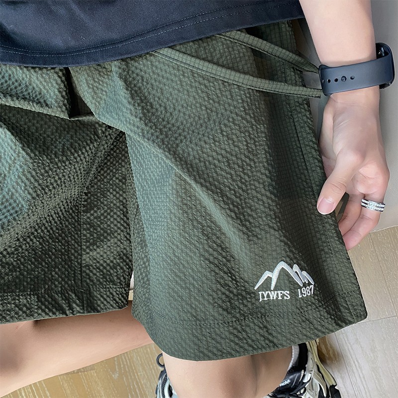 Shorts de gasa de hielo de seda de secado rápido para hombres verano americano deportes sueltos pantalones de playa de cinco puntos comercio exterior al por mayor transfronterizo