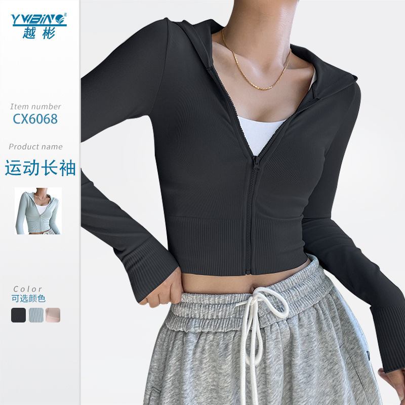 Abrigo de yoga Otoño e Invierno nueva ropa de entrenamiento ajustada elástica de secado rápido de manga larga con capucha superior deportiva para mujeres