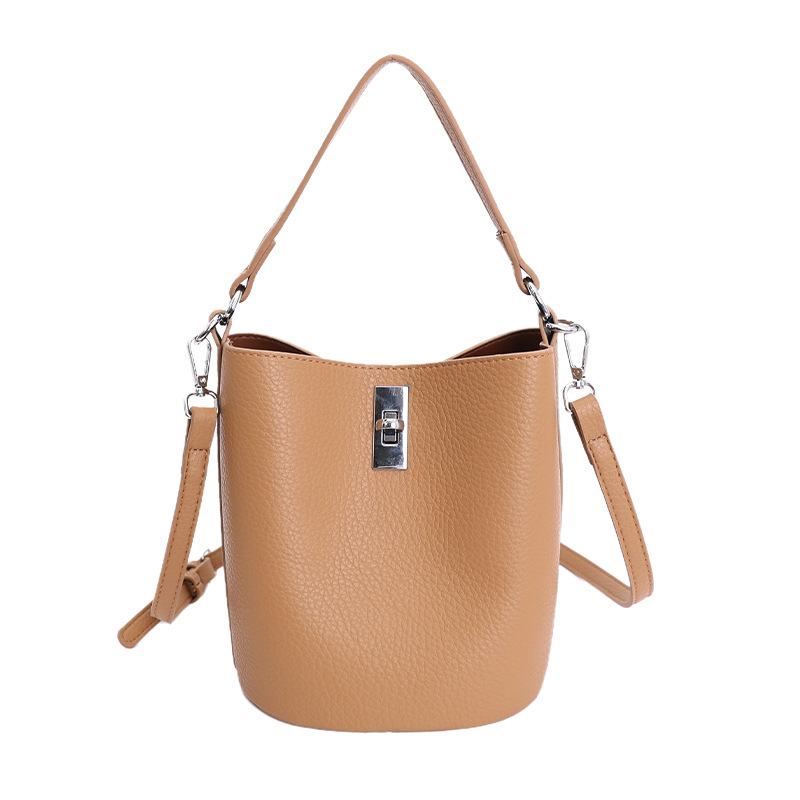Bolso de nicho coreano portátil cubo de agua bolso para niños ventas calientes nueva textura de alta calidad lujoso ligero ocio versátil bolso de mochila