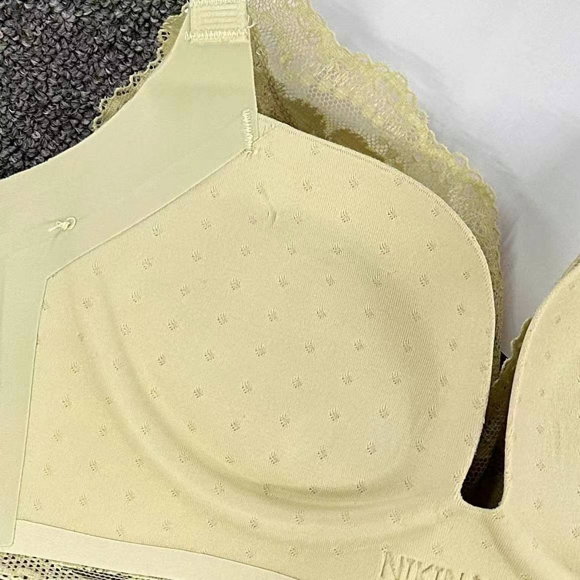 Nuevo sujetador de alta calidad de moda de encaje jacquard transpirable y cómodo ajustable anti-caída reunido tres filas de ropa interior de botón