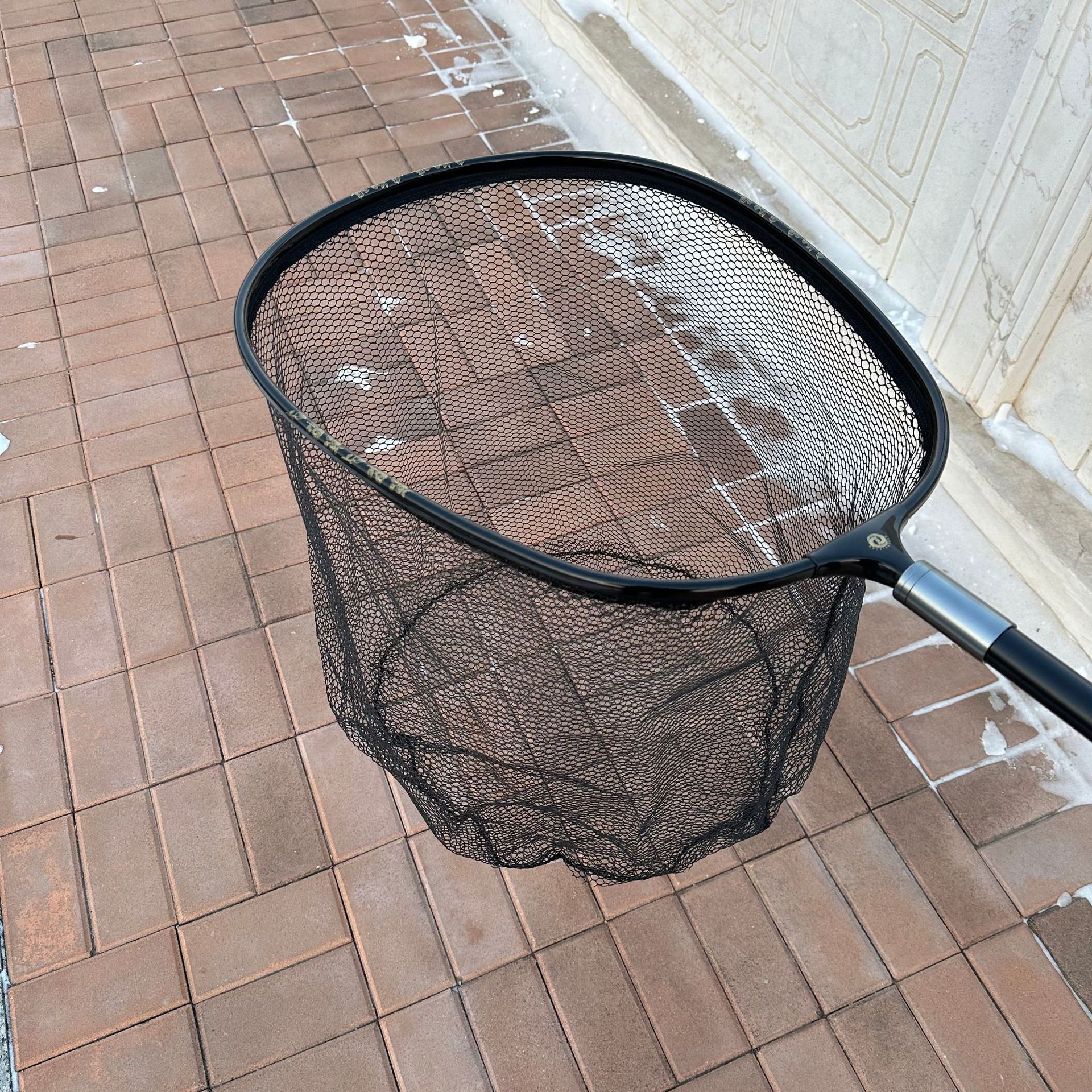 Oval large object rubberized mesh head black circle