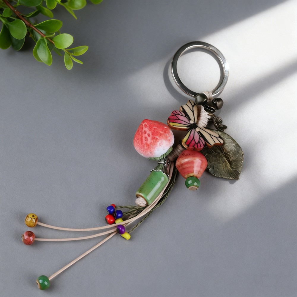 Jingdezhen cerámica hecha a mano colgante de cadena de teléfono móvil pareja llavero de dibujos animados frutas hojas de fresa colgar joyas
