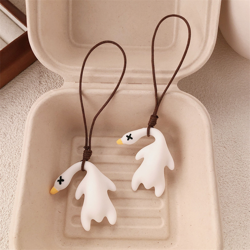 Pato asado que cambia de color Pato protector solar 2025 nuevo colgante de bolsa que cambia de color