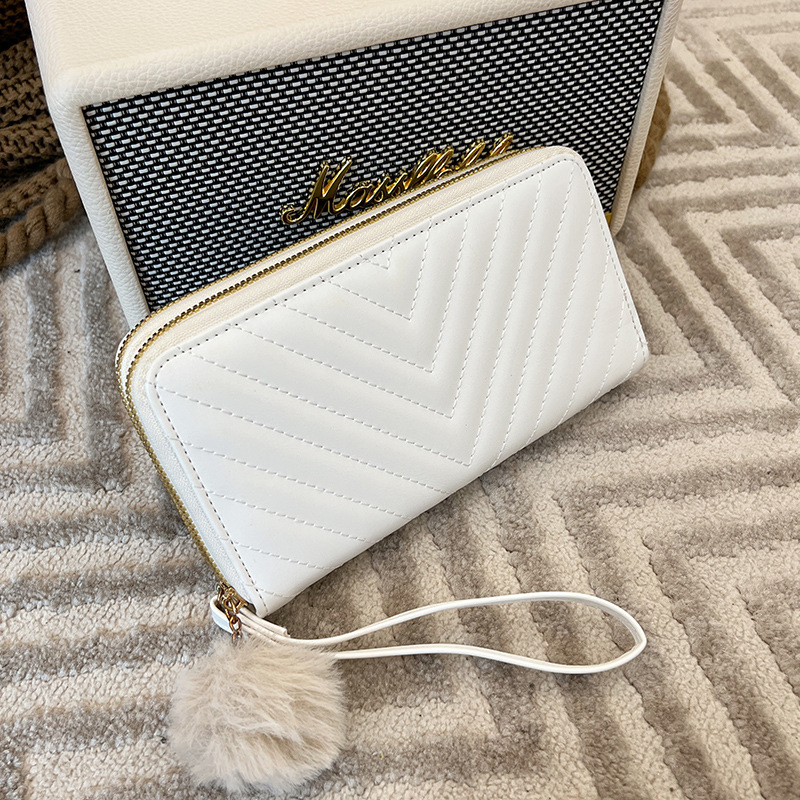 La cartera de las mujeres al por mayor 2022 nueva textura de la moda del embrague del todo-fósforo del bolso de dos monederos doblez de la cartera