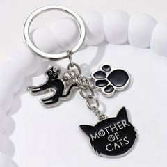 ファッション悪魔猫爪キーホルダー-金属円形ペンダント、バッグとバックパックの完璧なアクセサリー