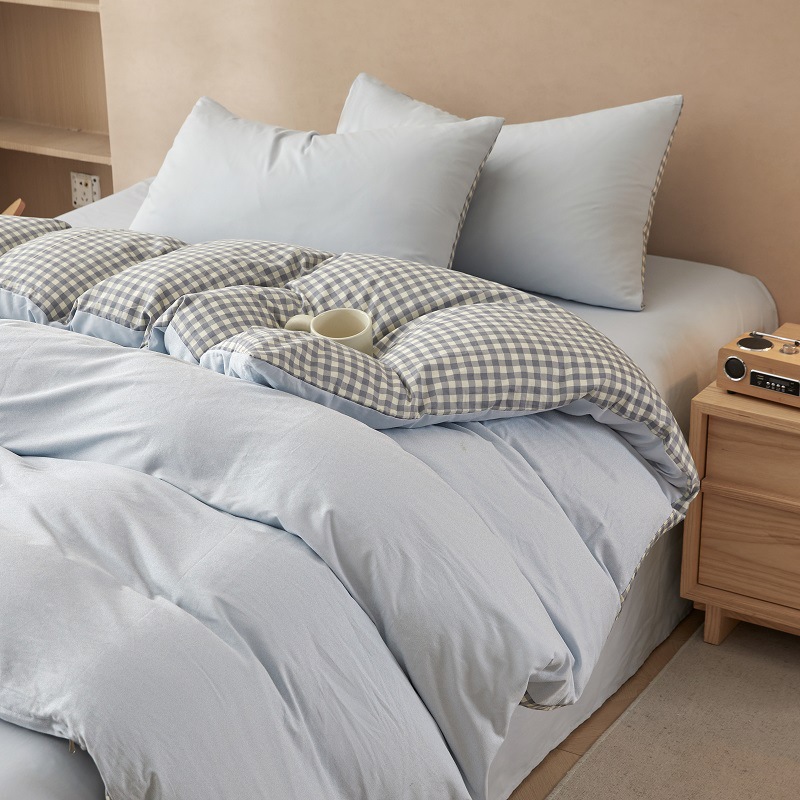 Nuevo traje de cama de algodón lavado de algodón de cuatro piezas de algodón 2025 nuevo traje de dormitorio de funda de edredón de sábana simple de tres piezas