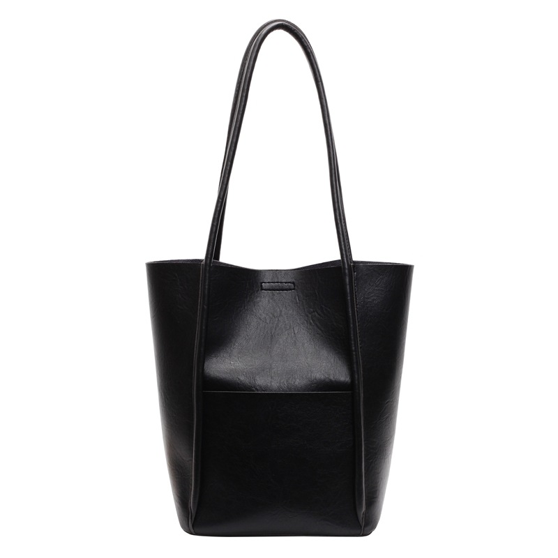 Bolsos de balde transfronterizos para niños 2024 nuevos bolsos de mujer de alto nivel retro bolsos de hombro bolsos de mano simples casuales