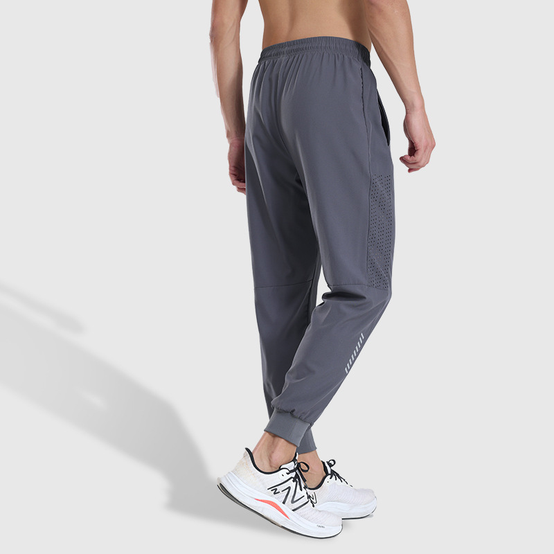Pantalones deportivos de secado rápido Entrenamiento de fitness para hombres Seda de hielo verano Delgado transpirable tobillo-atado corriendo pantalones tejidos Casuales