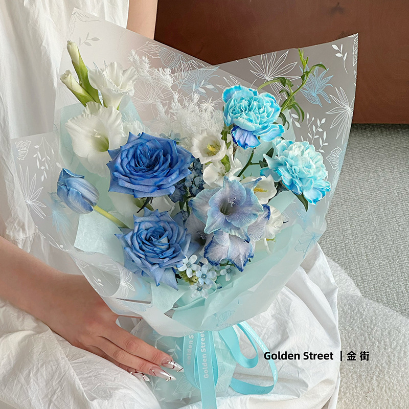 Huaxi rosa cristal OPP papel de embalaje de flores vidricola impresión transparente ramo de flores papel de embalaje de flores