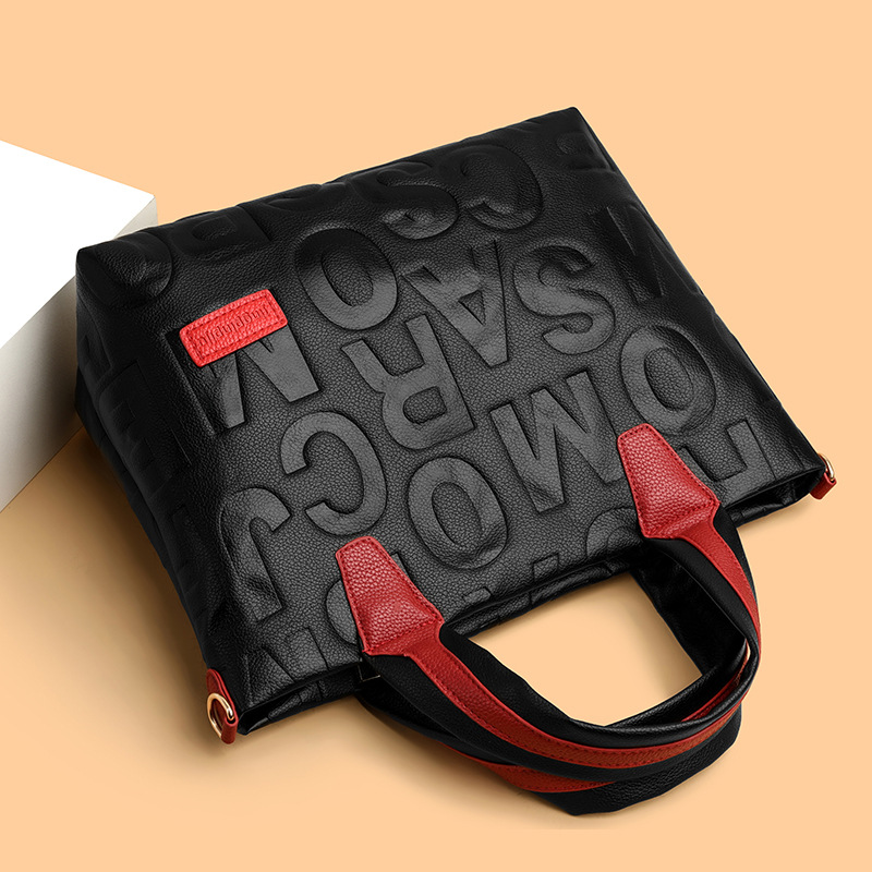 Comercio exterior transfronterizo nuevo bolso de mano de moda elegante Carta en relieve de moda europea y americana de gran capacidad bolso de hombro