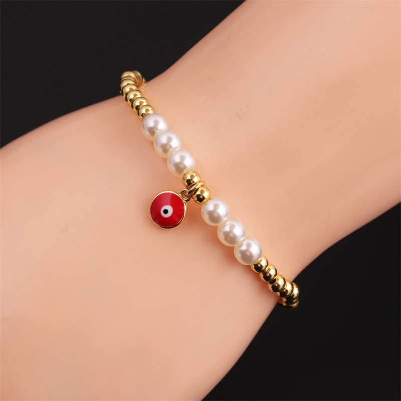 Korean copper-plated real gold dripping oil devilu0027s eye beads bracelet wholesale Nihaojewelry