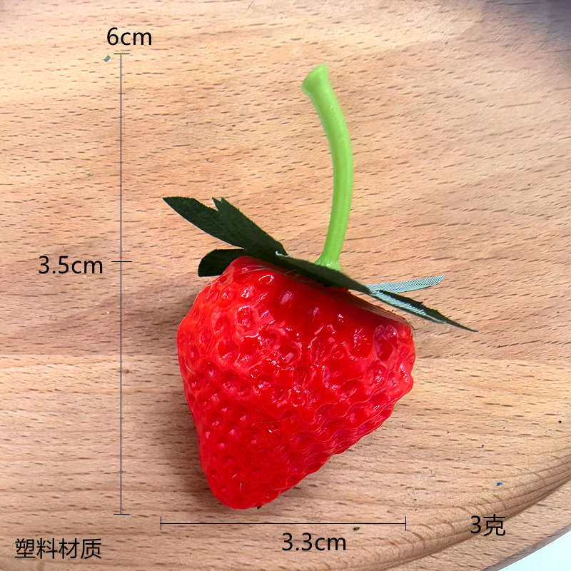 Realistic plastic strawberry with accessories