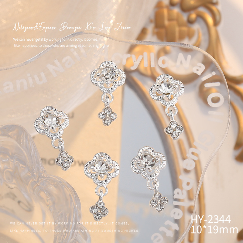 Nueva joyería de aleación de manicura completa diamante borla arco corona plata uñas manicura joyería accesorios al por mayor