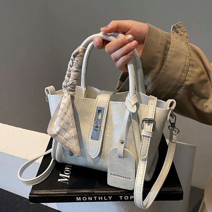 Bolso de mano universal de alta sensación para mujeres 2024 nuevo popular bolso de cubo de agua super caliente nicho de moda retro mochila