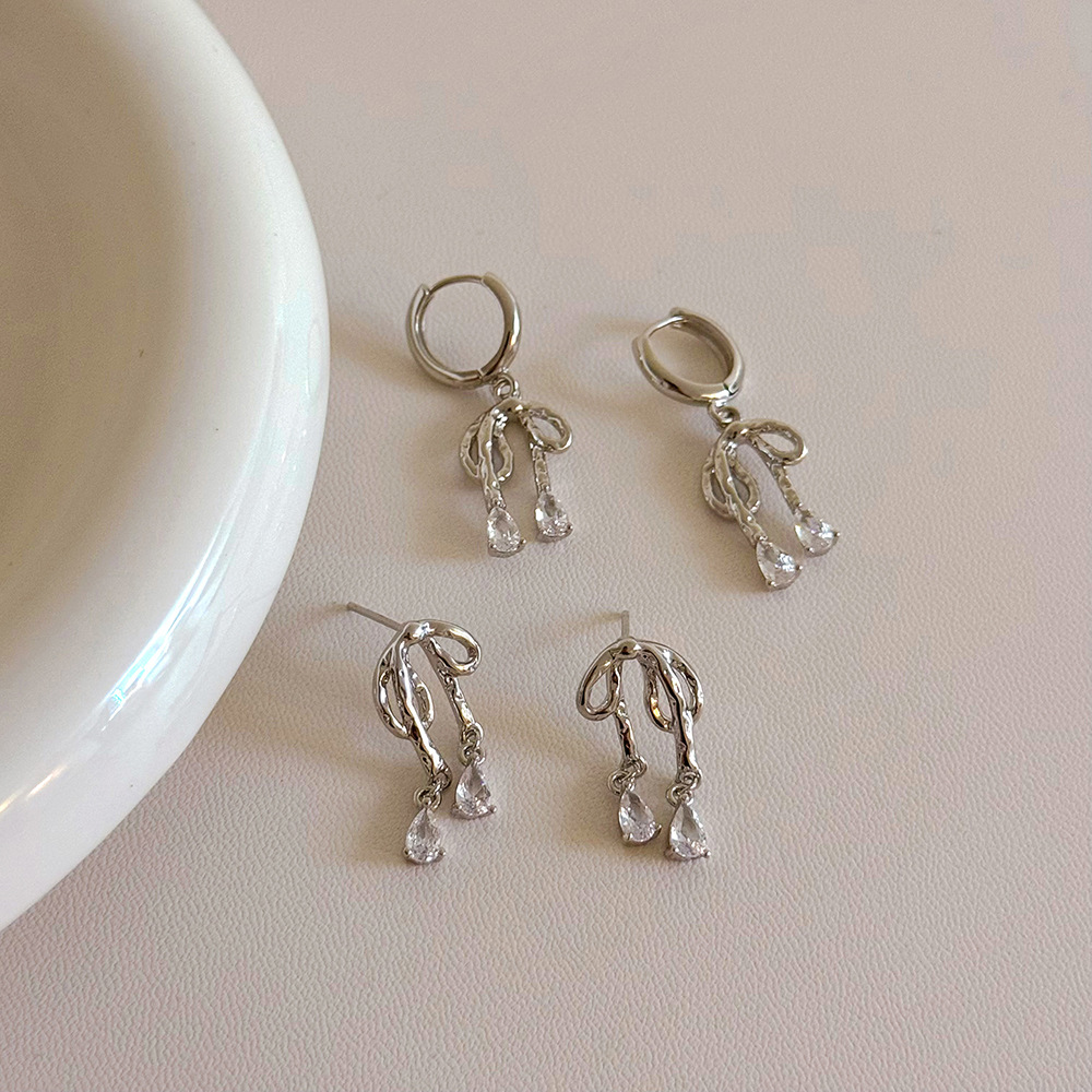 Cute elegant earrings with bow with zircon