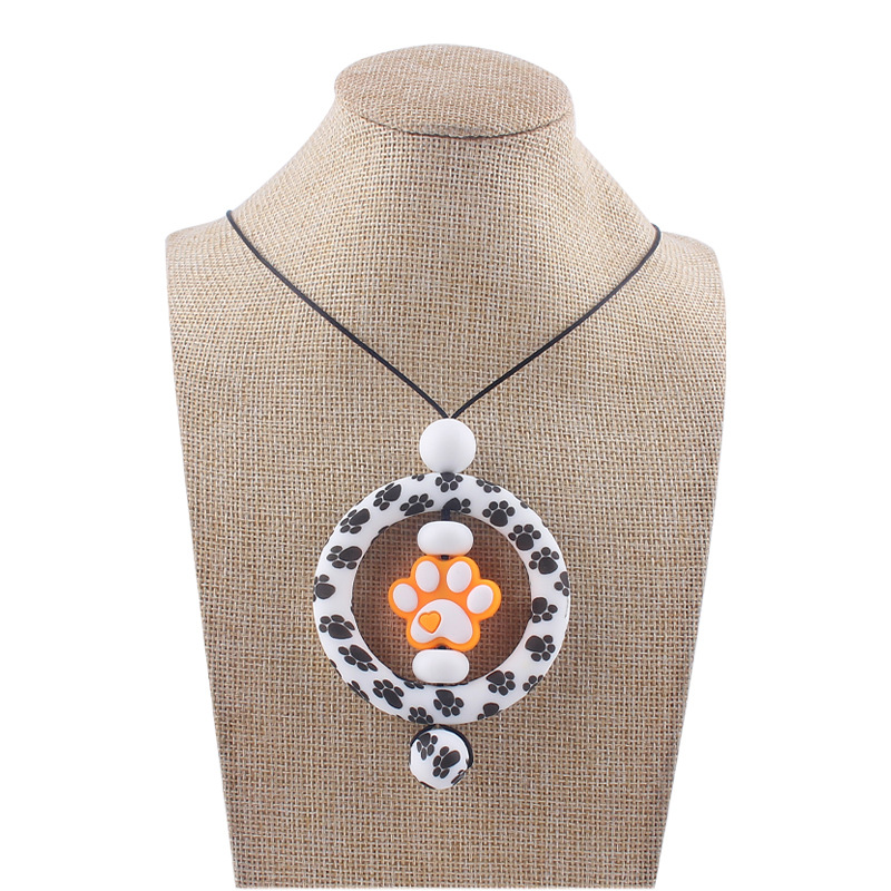 Suministros para bebés de dibujos animados perro garra collar creativo bebé cuentas de silicona mordedura molar COLLAR COLGANTE hecho a mano