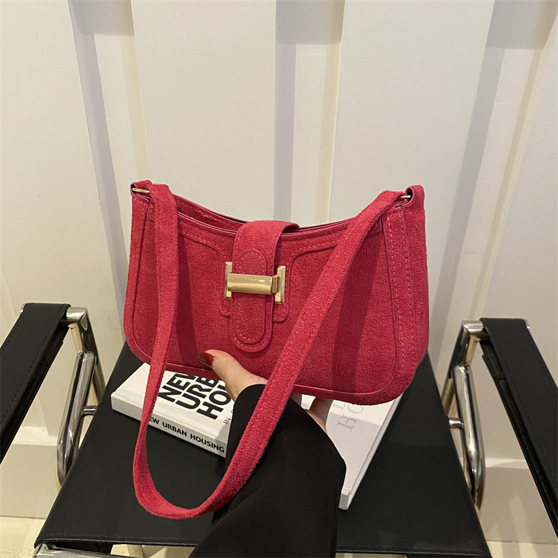 Diseño de nicho francés bolso de axila retro mujer 2024 nueva textura hebilla de cinturón bolso de mensajero de hombro de moda mujer