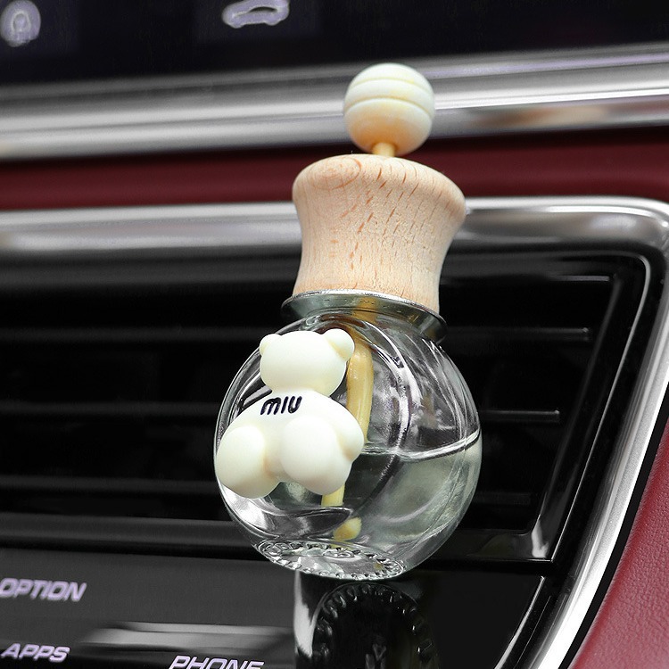Aromaterapia de coche nuevo 2024 aire acondicionado de coche salida de aire botella de decoración perfume fragancia ligera de larga duración pequeña decoración de coche
