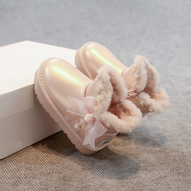 Zapatos de algodón princesa de arco de niñas para niños botas de nieve de lana de invierno 2025 nuevas niñas zapatos de algodón gruesos