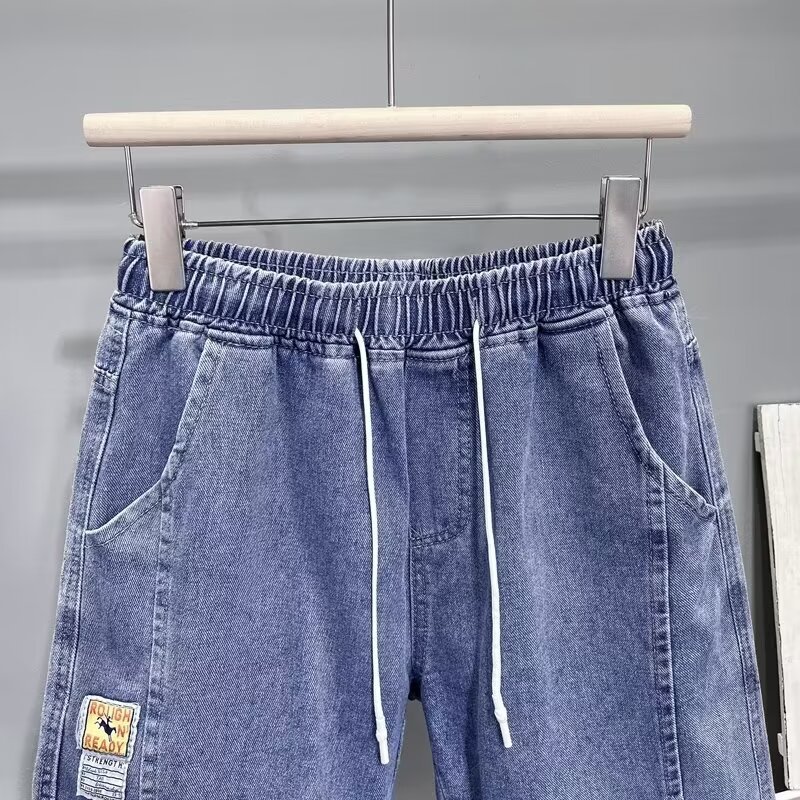 2024 nuevo estilo de verano nuevo estilo estilo de Hong Kong marca de moda simple degradado pantalones cortos de mezclilla casuales de pierna ancha pantalones de cinco puntos