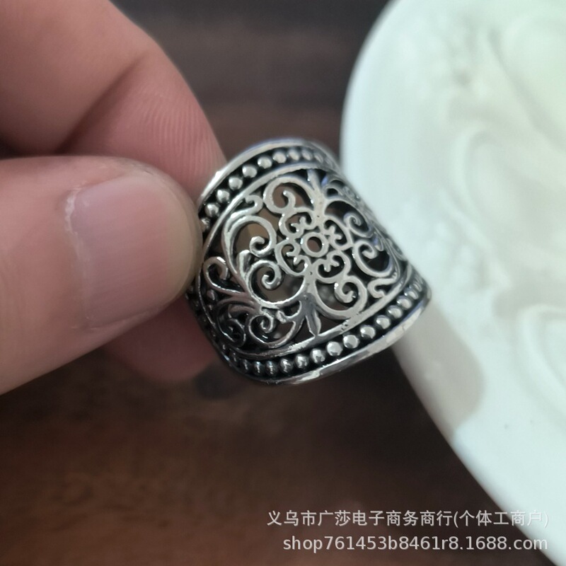 Bohemian-style, minimalist, and creative wide-band ring with carved patterns; a new, cross-border, retro, and hollow floral ring Bohemian-style, minimalist, and creative wide-band ring with carved patterns; a new, cross-border, retro, and hollow floral ring