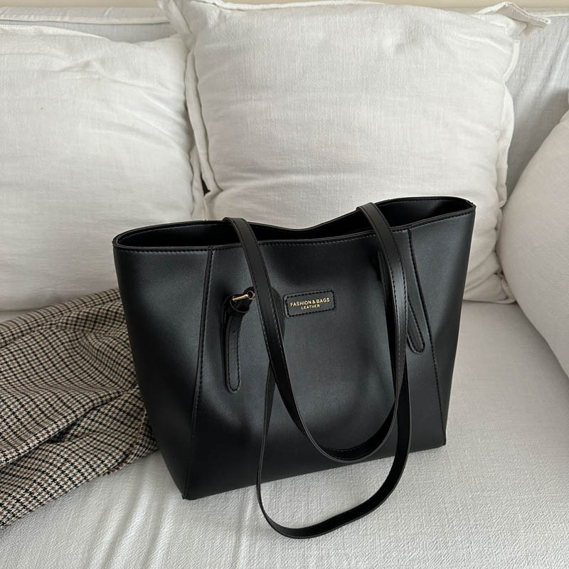 Bolsa de mano de viaje de color sólido bolsa de mano nueva alta alta capacidad axilar otoño y invierno 2024 bolsa de trabajo bolsa de mujer