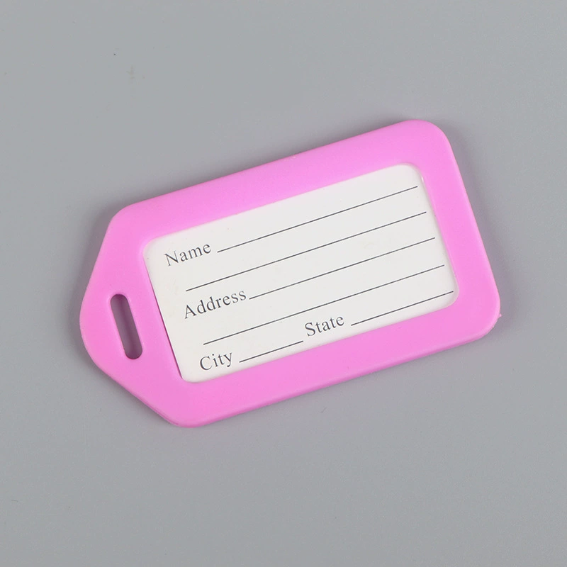 Plastic luggage tag, suitcase, airplane