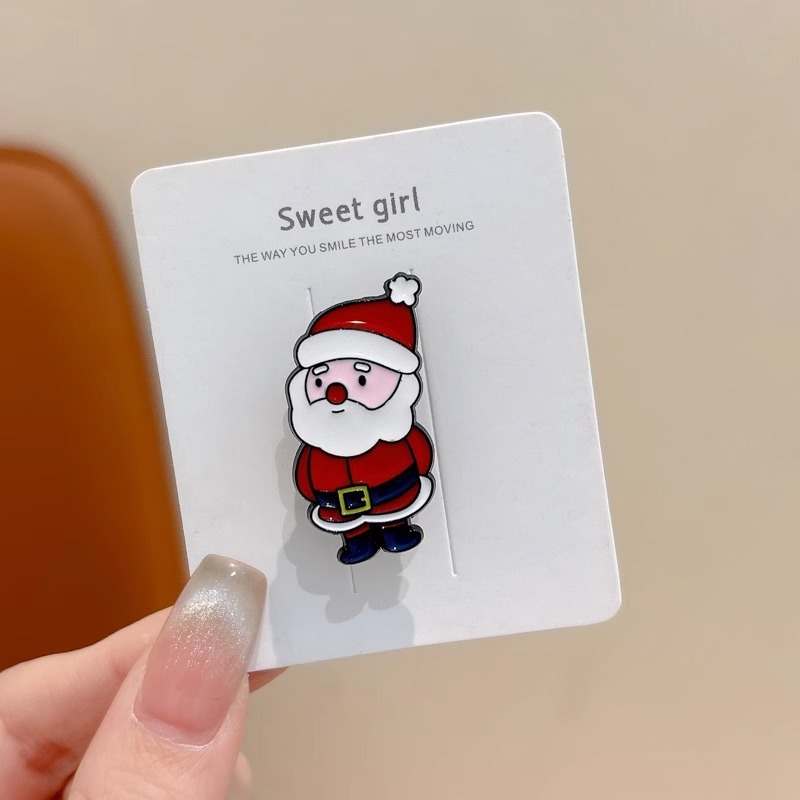 Broche de aleación de sentido avanzado japonés nueva insignia de personalidad de moda femenina de dibujos animados bolsa de Navidad accesorios de metal al por mayor