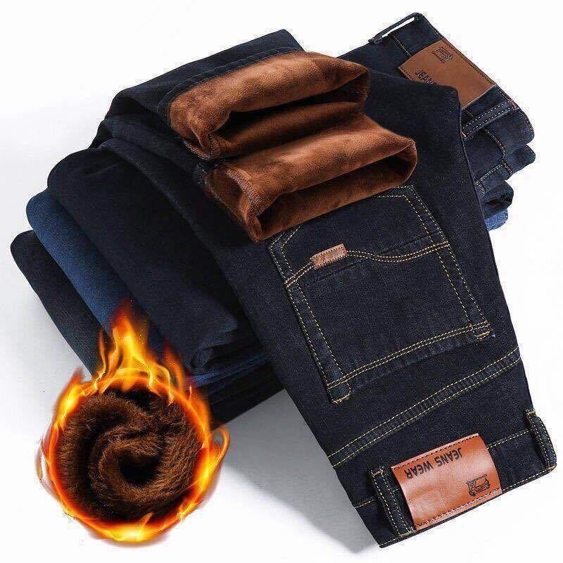 Otoño e invierno hombres más jeans gruesos de terciopelo hombres al por mayor pantalones de pierna recta sueltos de todo fósforo casuales pantalones de algodón cálidos y resistentes al desgaste hombres