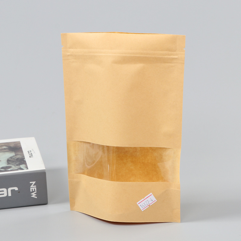 Spot bolsa de papel kraft con ventana transparente bolsa de embalaje de alimentos autosellada autoportante bolsa de té sellada de ocho lados fácil de rasgar