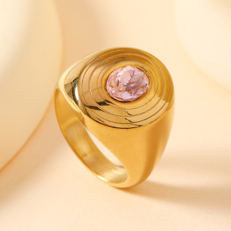 Gold + pink gem (elliptical second line)
