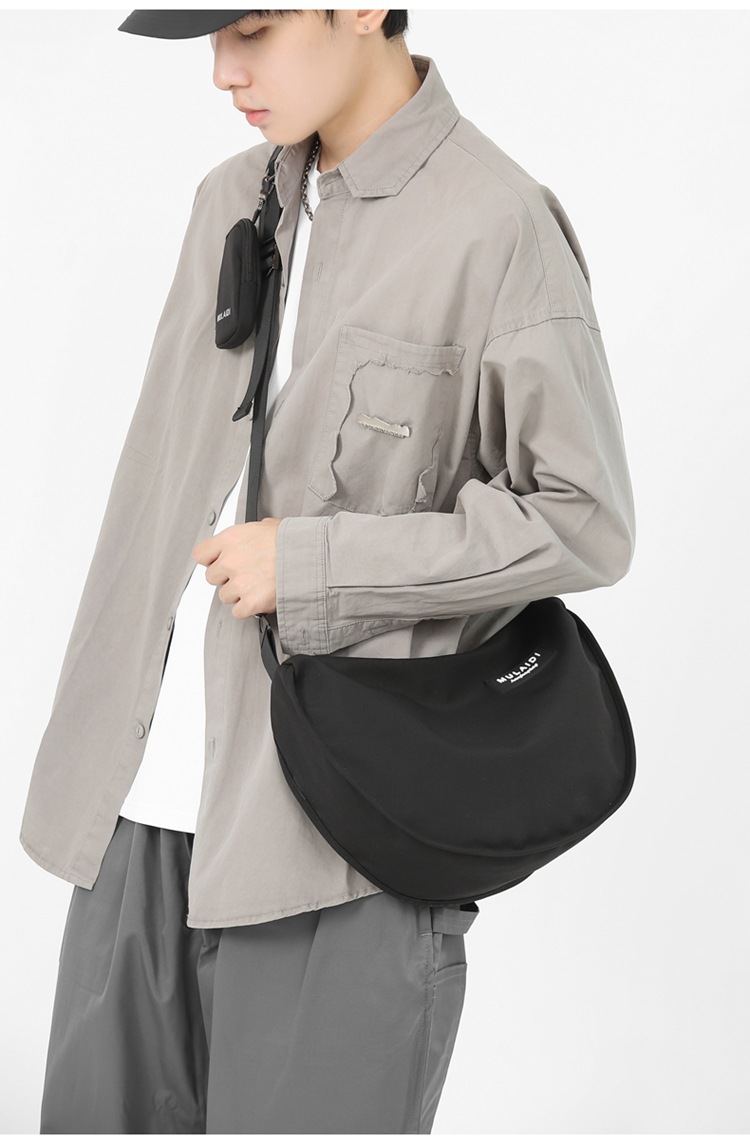 Japanese-style casual dumpling bags, sporty crossbody bags, large-capacity canvas bags for women, single-shoulder commuting bags for students to class, trendy undefined