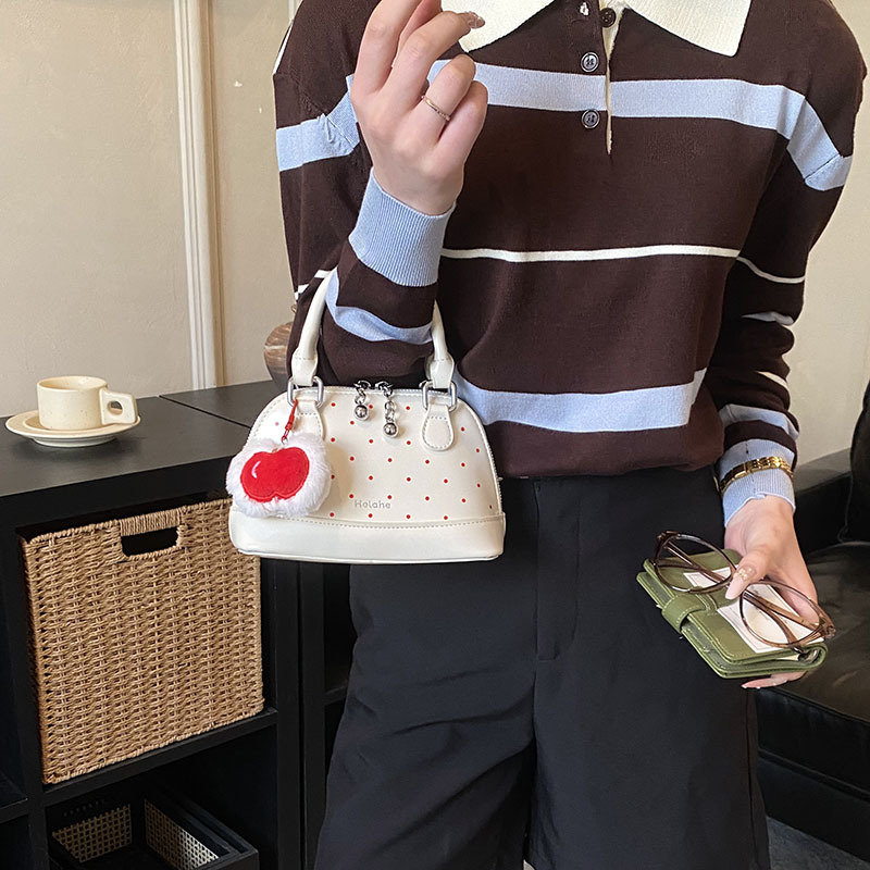 Bolsas coreanas para niños y niñas, bolsas de conchas, bolsas de mano de manzana, bolsas para niños, bolsas de comercio exterior transfronterizas 2026