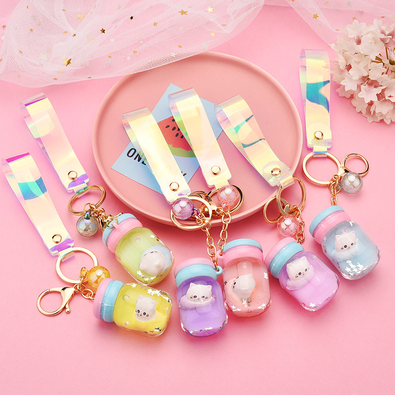 Cute Acrylic Simulation Yogurt Bottle Floating Kitten Doll Keychain Wholesale Nihaojewelry display picture 1