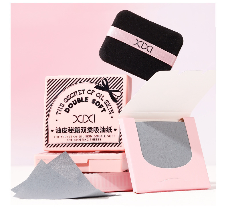 xixi Oil-absorbing Paper comes with a powder puff, touch-up makeup mirror, and is a portable oil-removing and oil-absorbing facial tissue that is both oil-controlling and refreshing undefined