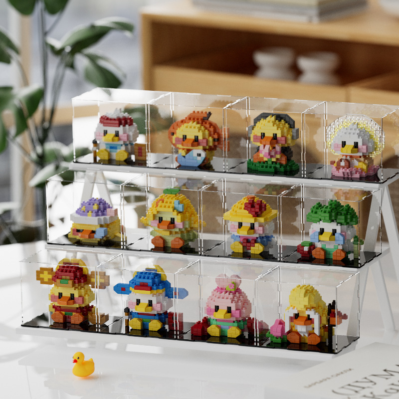 Chao Lechuang 8933 feliz con el patito de dibujos animados para hacerse rico en combustible muñecas de patos altos juguetes de bloques para niños al por mayor