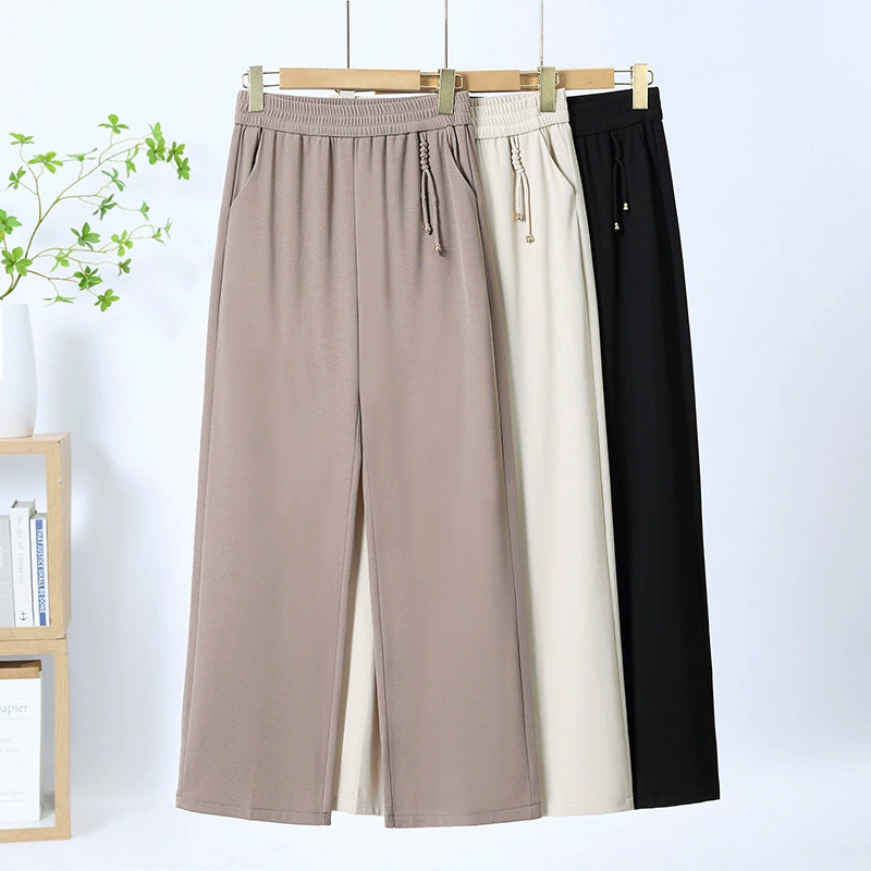 Женские брюки среднего и пожилого возраста 2025 летний новый стиль мамы широкие брюки с эластической талией большого размера повседневные дикие прямые брюки