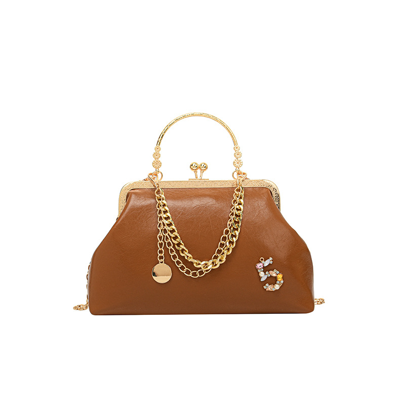 Dames 2023 nieuwe gouden mondtas Trendy modeketen één schouder handtas dinertas_voghion.com
