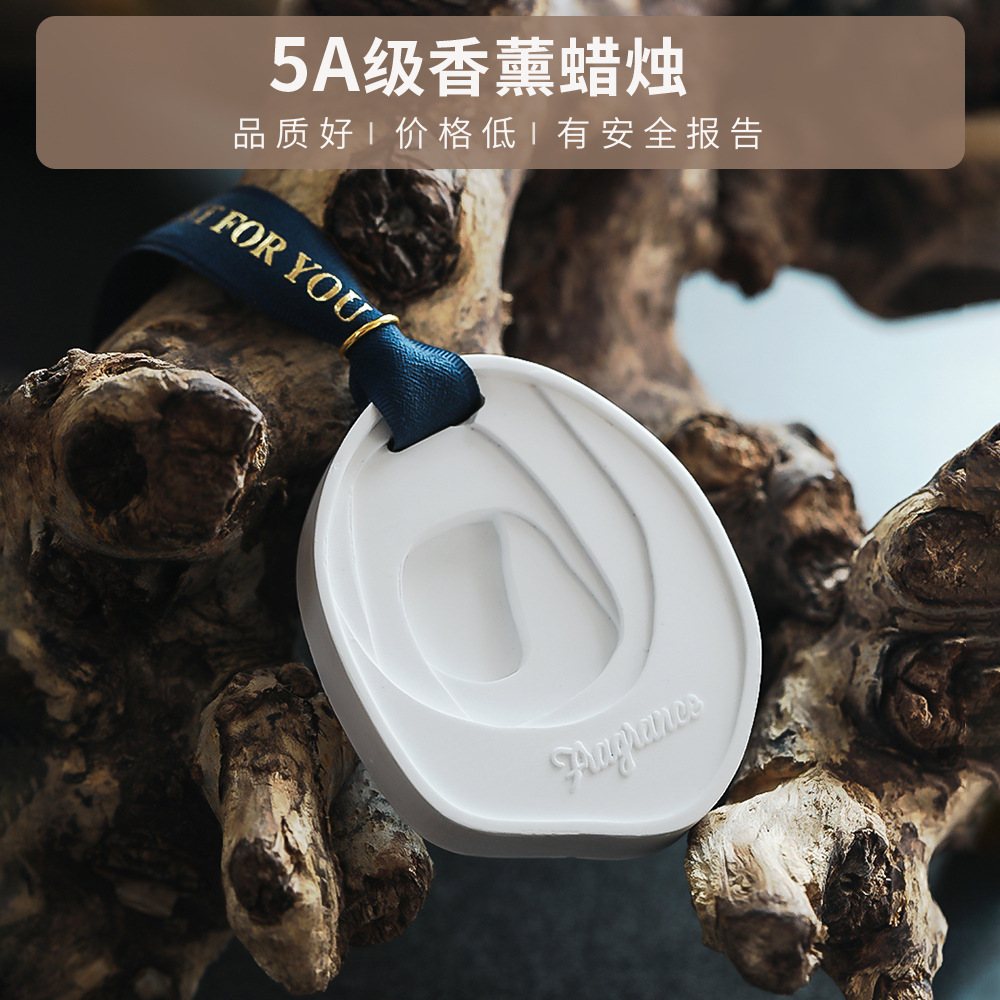 Perfume colgante de alta sensación de regalo de vestuario colgante de perfume montado en automóviles sólidos interiores adornos de banda magnética de expansión de perfume