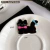 Гладкая чёрная кошка