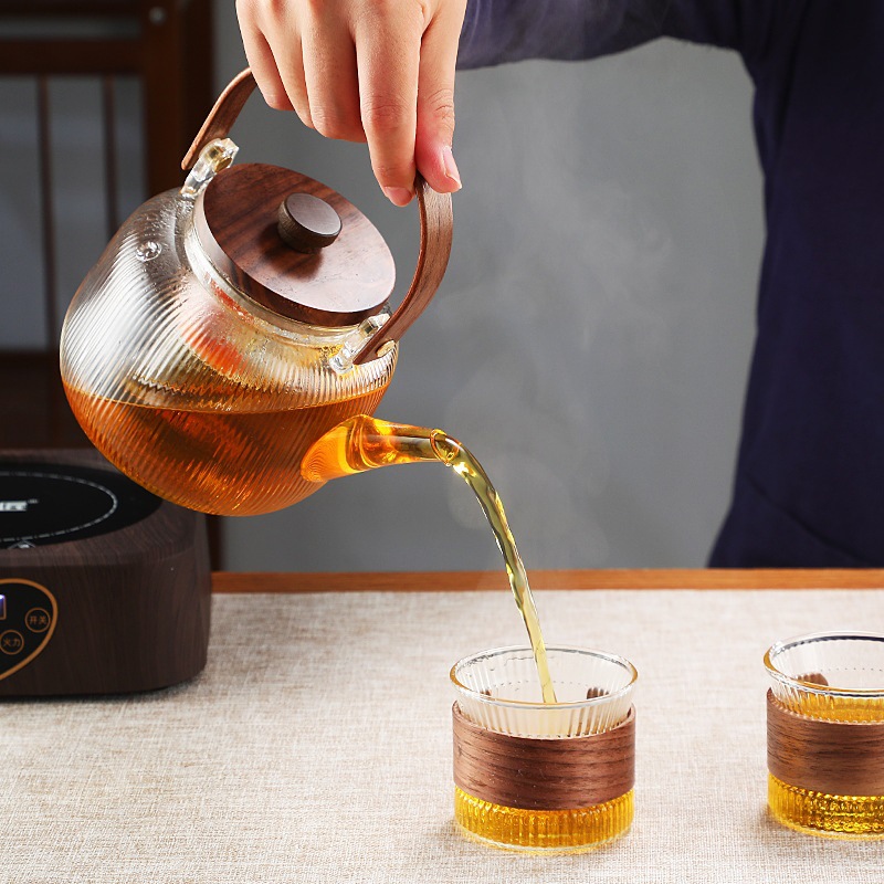 Nueva nuez cocina olla de haz integrado celebridad de Internet resistente al calor olla de vidrio borosilicato resistente a altas temperaturas de cuatro generaciones tetera hirviendo