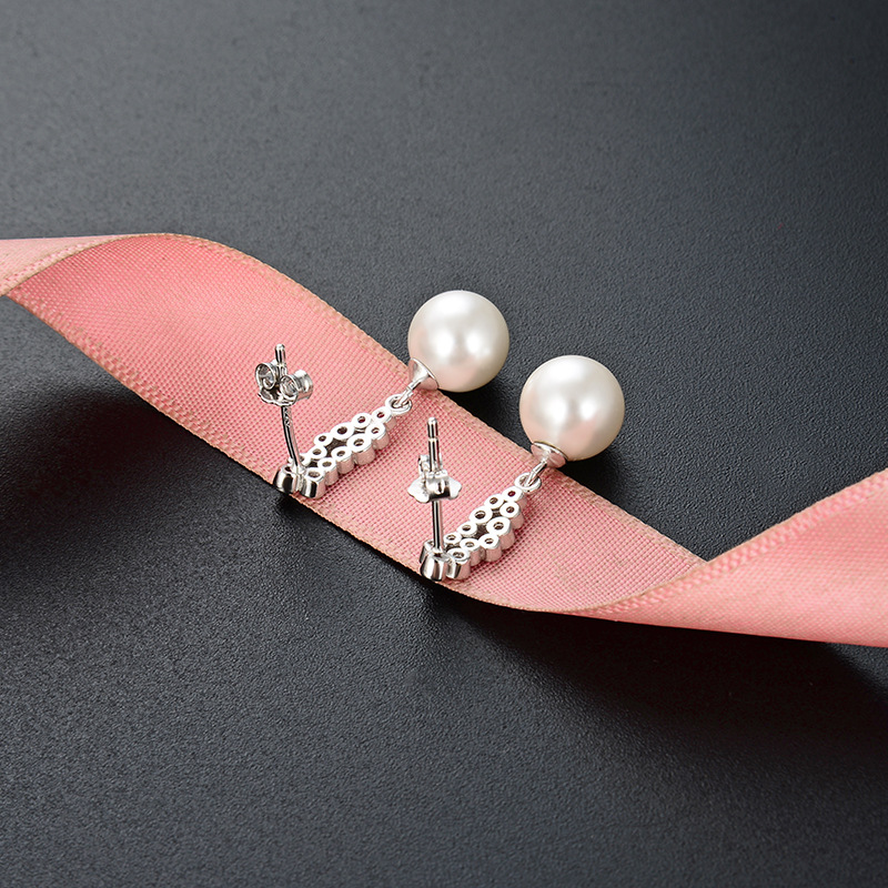 Corea del Sur simple elegante creativo Zircon pendientes s925 plata esterlina moda perla pendientes para las mujeres al por mayor