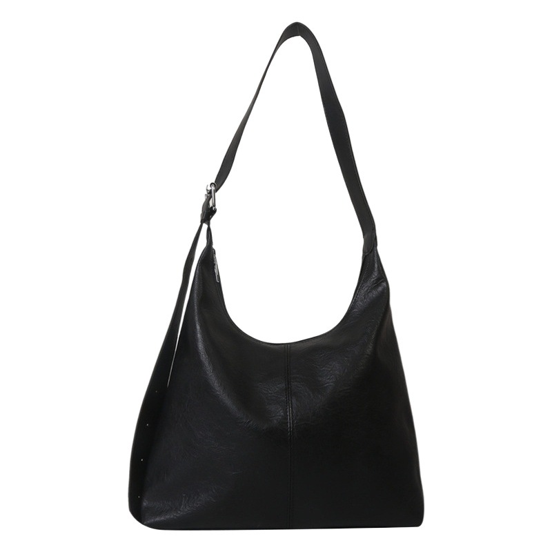 La bolsa de asas del bolso del color sólido de la textura del viajero del bolso de las axilas del uno-hombro del estilo coreano de moda del todo-fósforo ins de este año para las mujeres