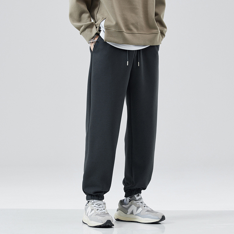 2025 otoño y invierno pantalones deportivos de pies de hombre pantalones de punto de gran tamaño sueltos pesados juveniles casual pantalones de moda image 4