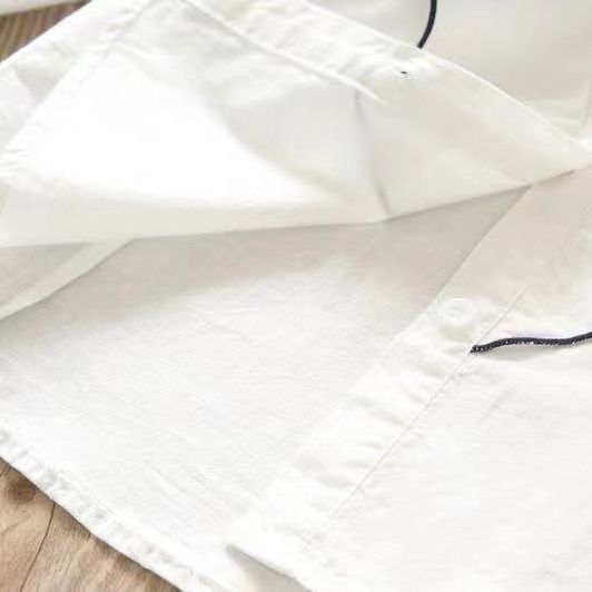 Primavera 2024 nuevas niñas medio y grande de los niños transpirable princesa manga larga con volantes solapa camisa blanca moda