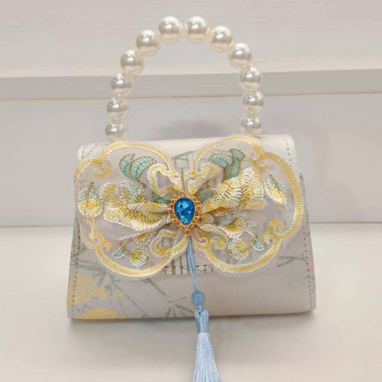 Bolso de perla arco de estilo nacional bolso de princesa bolso de Año Nuevo bolso de Año Nuevo bolso de accesorios para niños