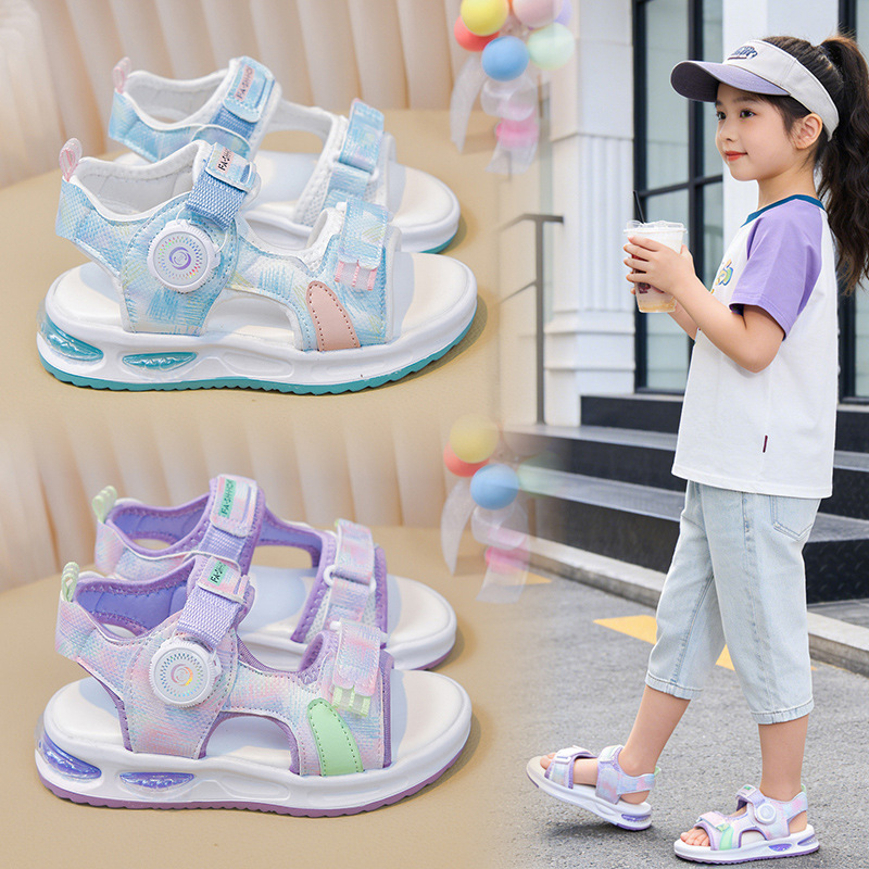 Sandallas de niñas 2026 verano nuevo niño moda versátil sandalias deportivas de suela suave botón giratorio zapatos de playa